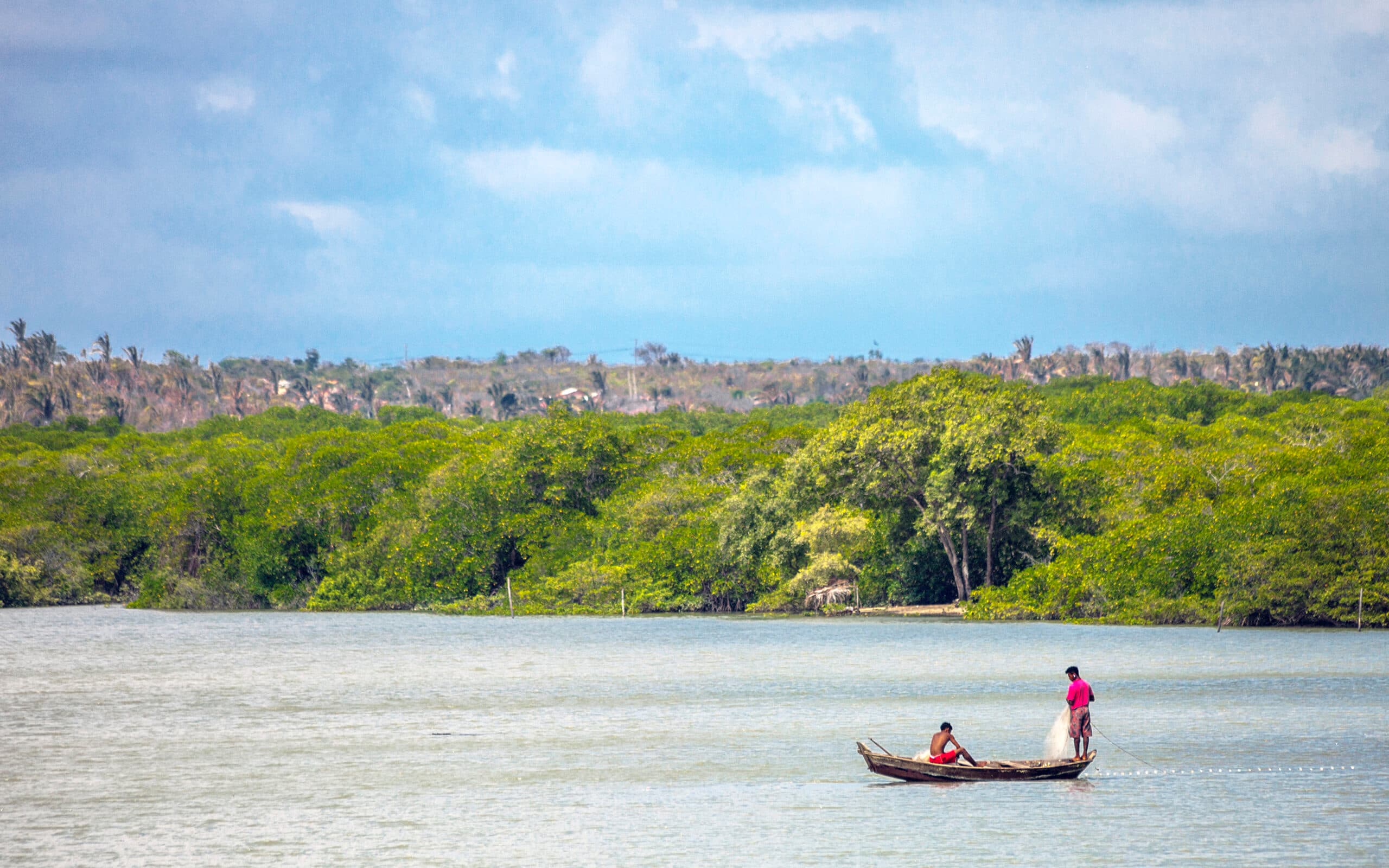 Maranhao State, Brightly Lit, Vibrant Color, Two People, Brazilian Culture, Fishing, Canoe, Multi Colored, Bright, Cultures, Tropical Climate, Travel Destinations, Nature, Rural Scene, Fisherman, People, Brazil, Sunlight, Day, Tropical Rainforest, Landscape, River, Village, Commercial Fishing Net, Nautical Vessel, Alcantara - Brazil, Sunny, Brasilien, Fiskare, Småskaligt fiske